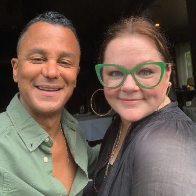 Yanic Truesdale together with actress Melissa McCarthy.